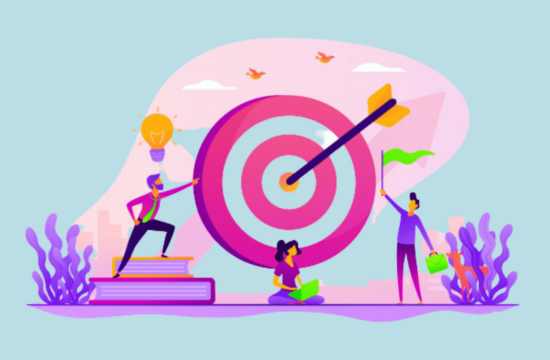 People celebrating around a bullseye to illustrate concept of setting and achieving product OKRs.